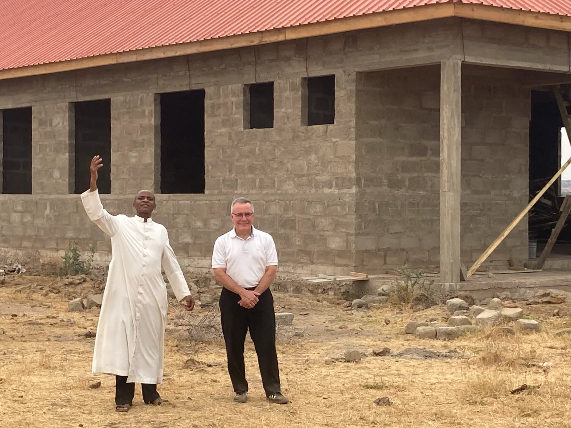 Sacred Heart Convent under construction with Fr. Andrew blessing the site